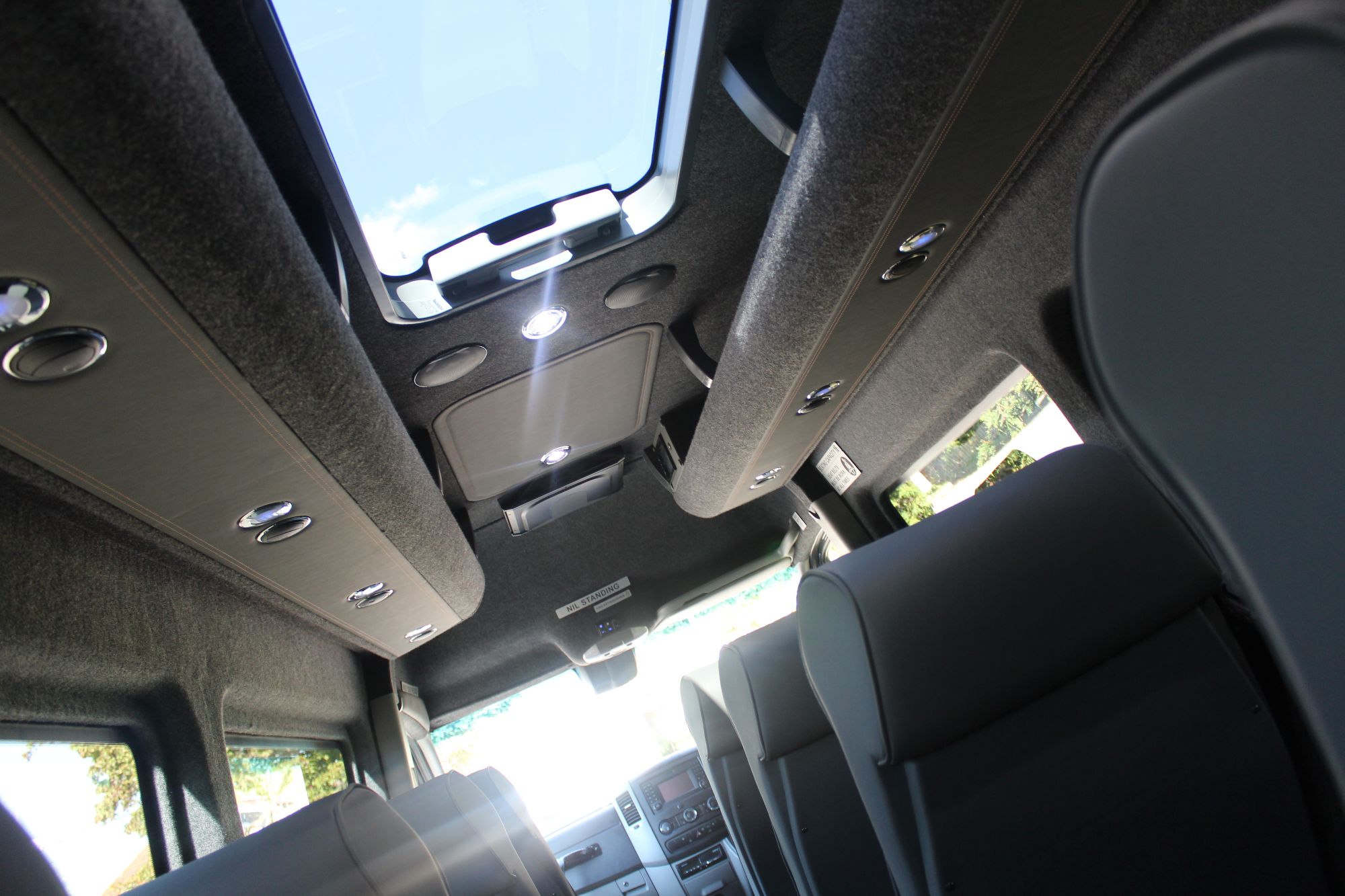 Image of Coach interior showing roof and seating materials