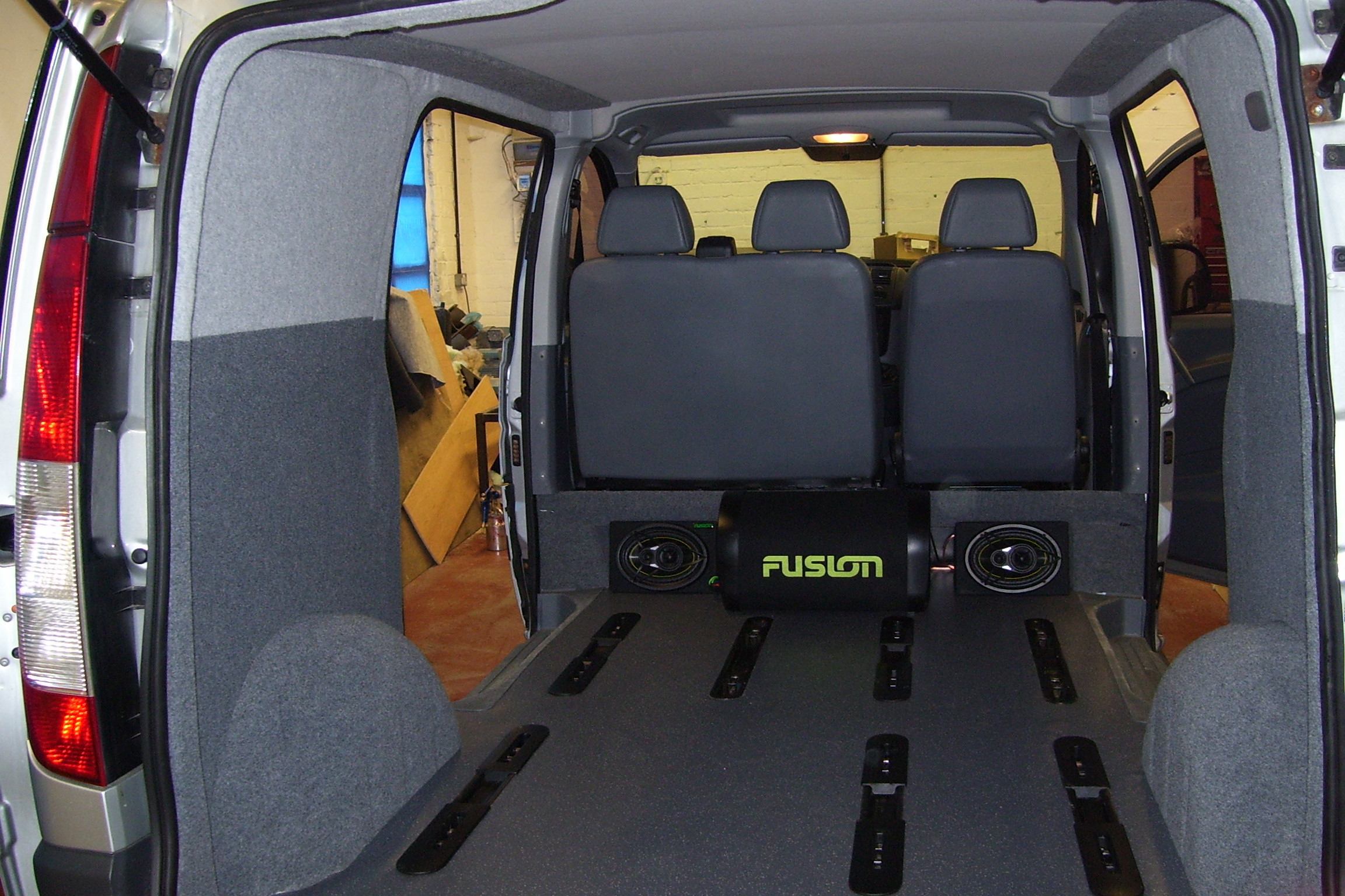 Image of Van interior showing Hi-flex velour carpet